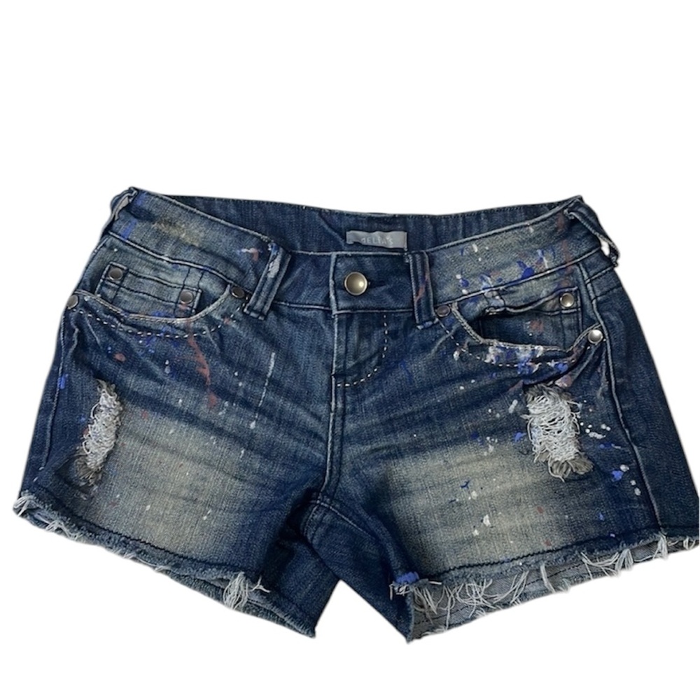 Deliaās shorts with red, white andā Blue paint splatter